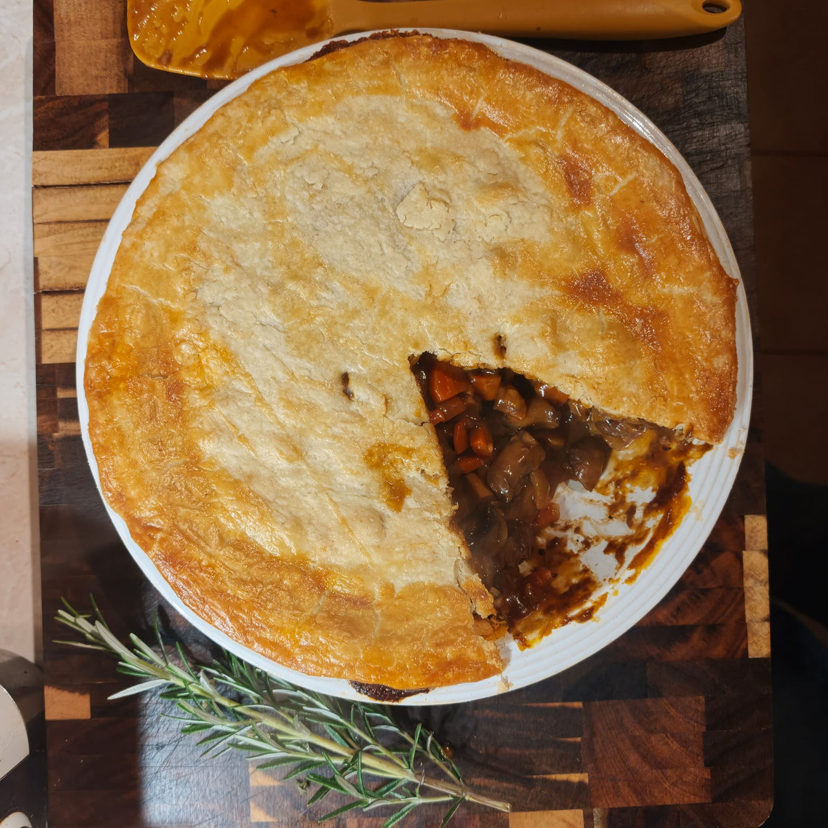 Mike's homemade shortcrust mushroom and chestnut pie with a serving removed