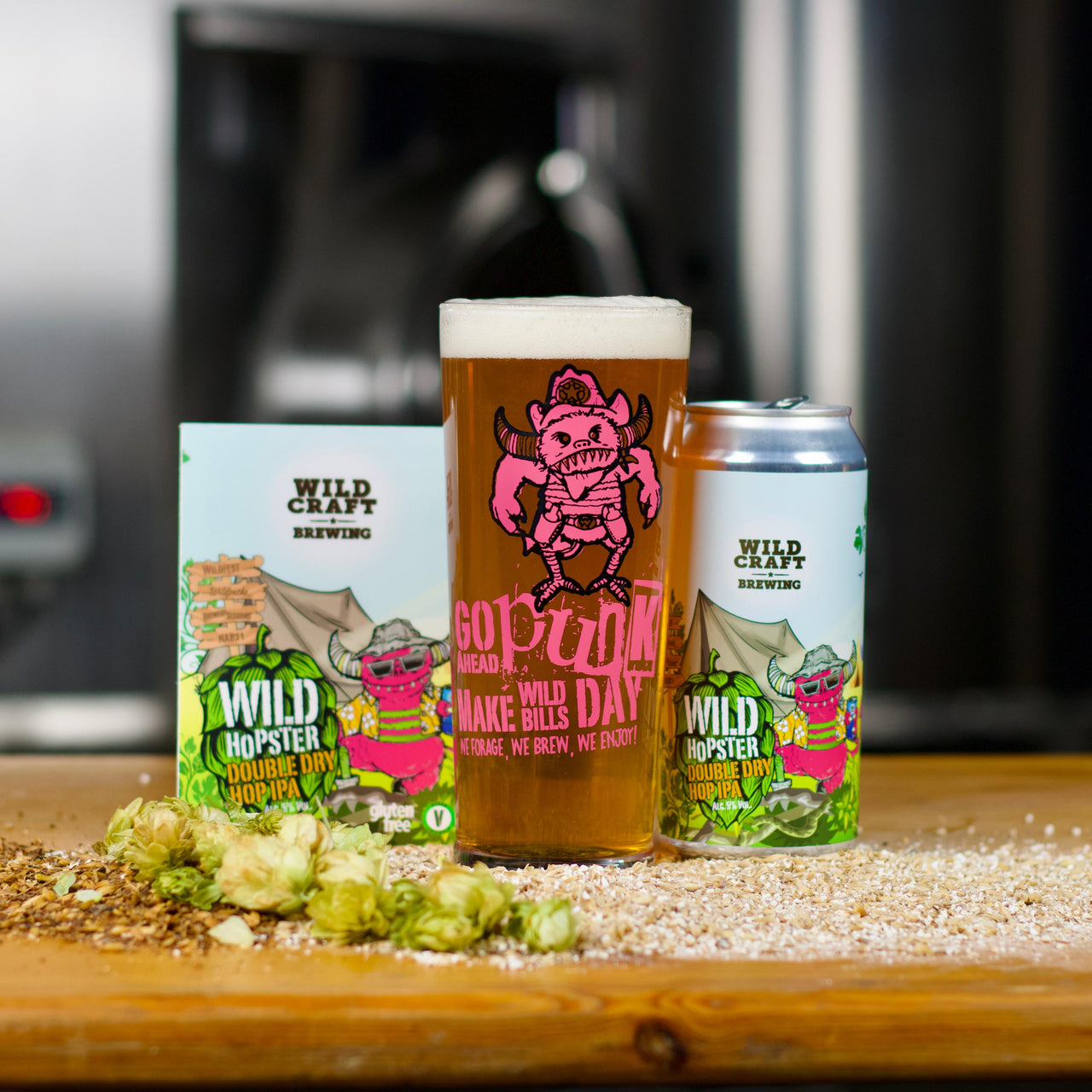 Can of Wild Hopster beer on a wooden surface with a blurred background