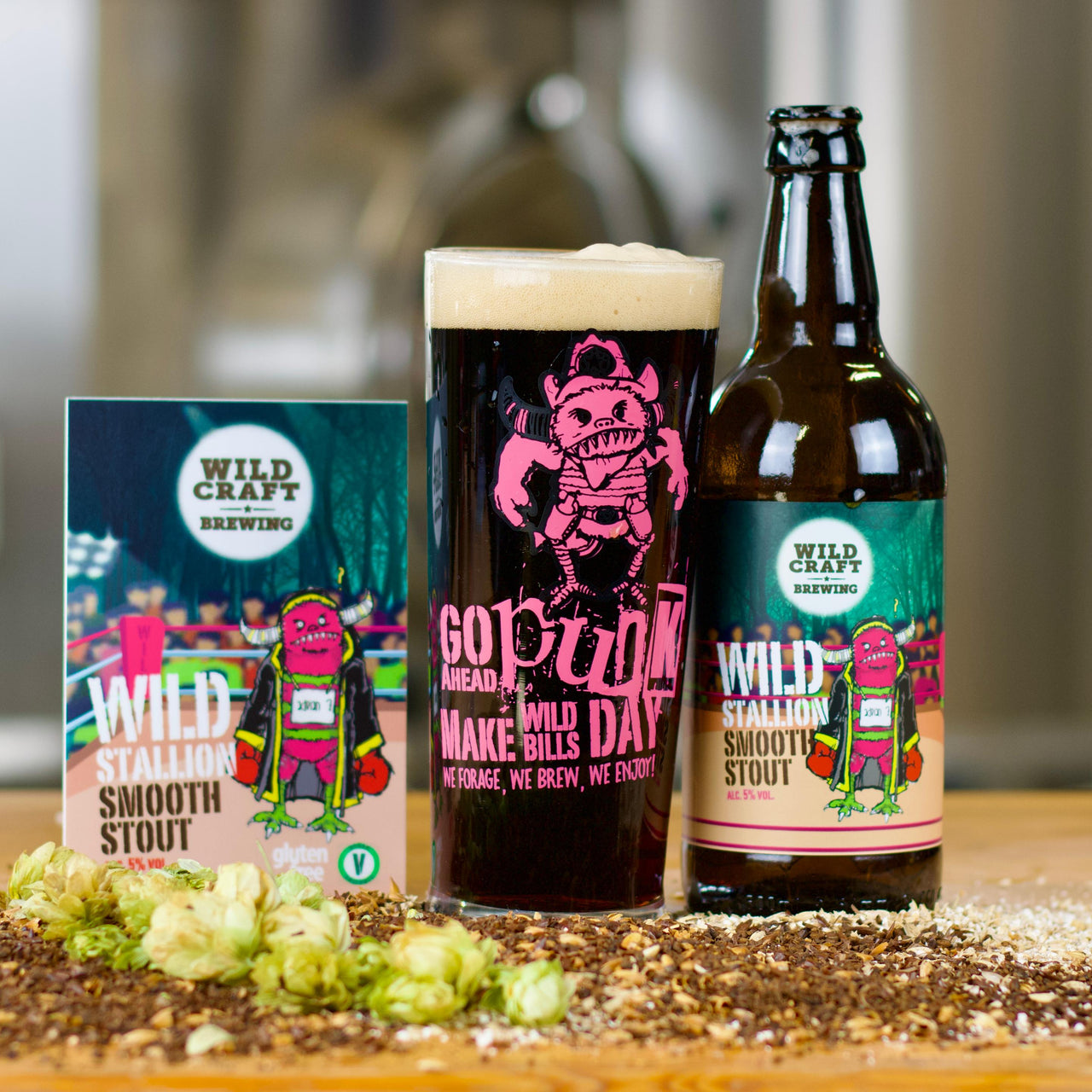 Wild Stallion beer bottle and packaging on a wooden surface with a blurred background